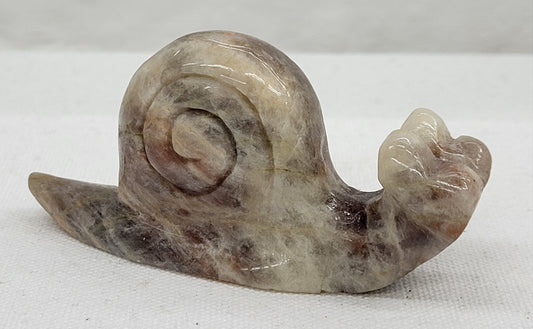 Moonstone snail carving