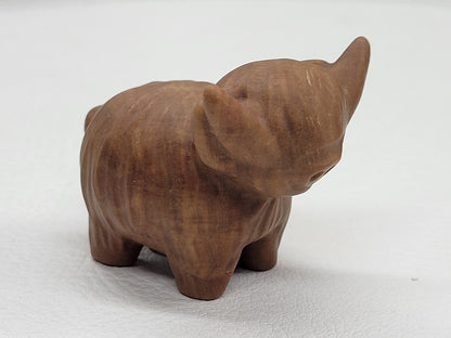 Highland cow carvings