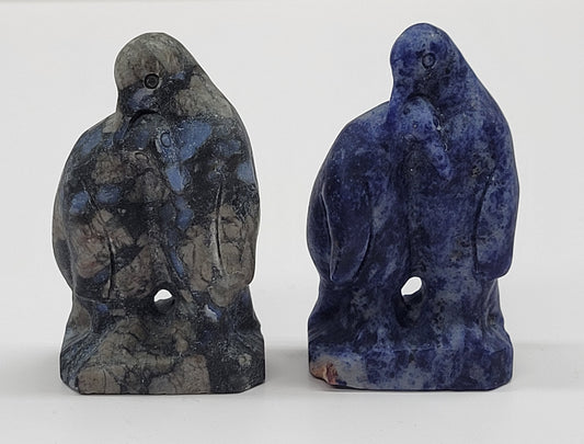 Penguin couple carvings (M)