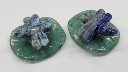 Dragonfly on lily pad carvings