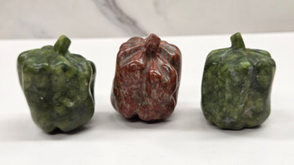 Vegetable carvings (pickle, carrot, pepper)