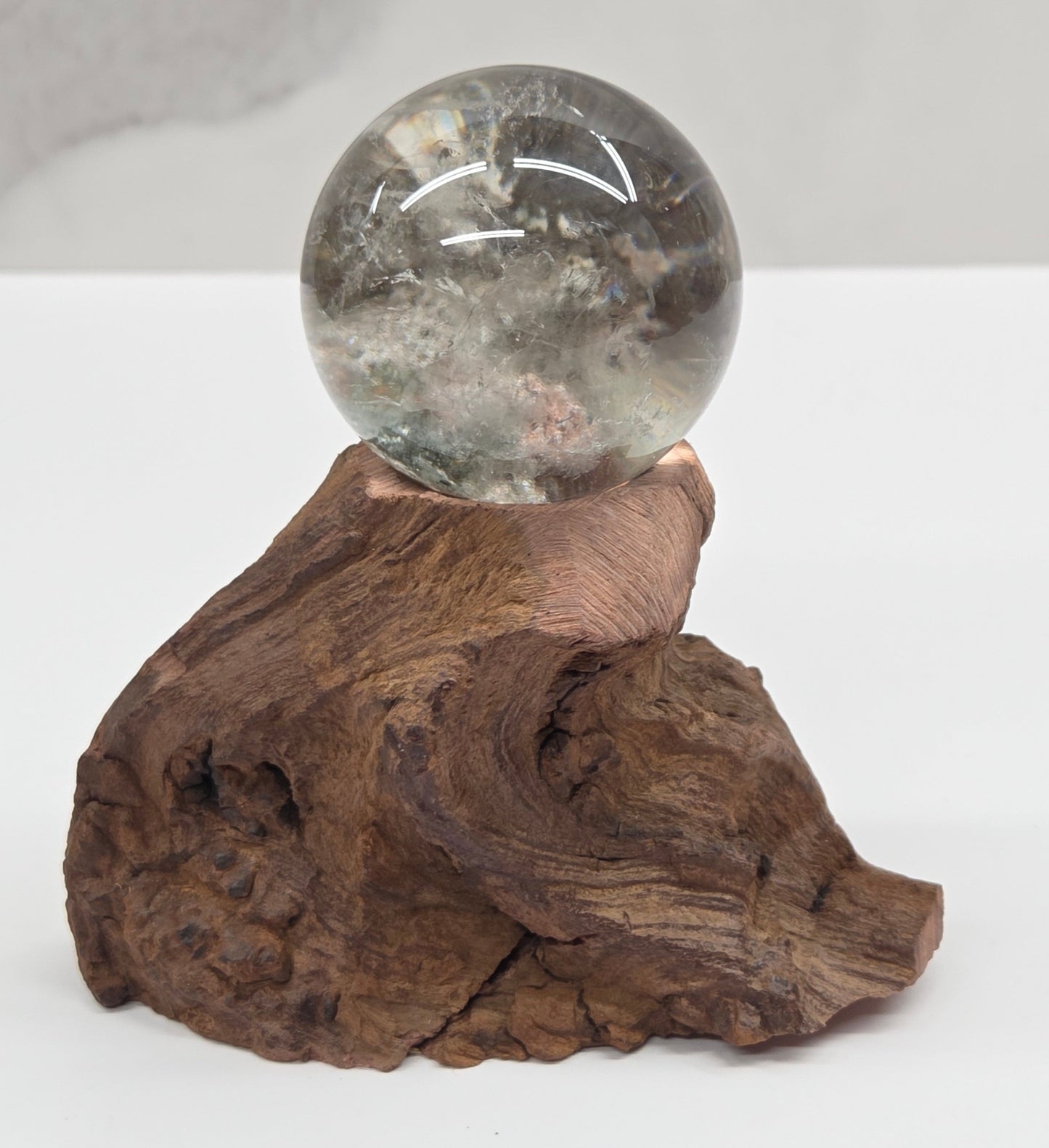 Garden Quartz statement sphere on driftwood stand