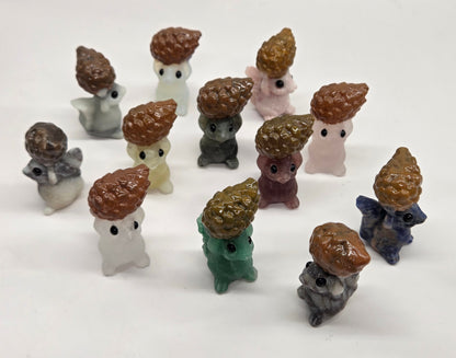 Squirrel holding nut carving