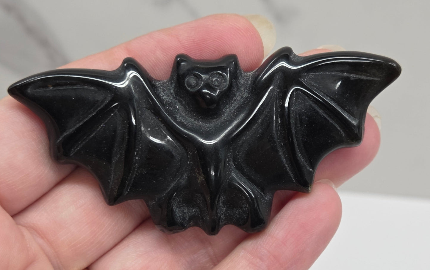 Bat carving (M)