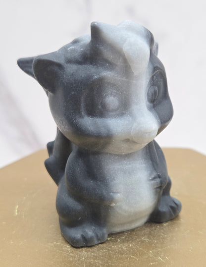 "Flower" skunk carving