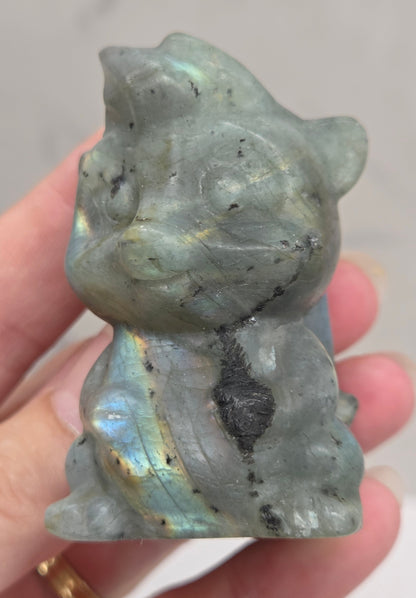 "Flower" skunk carving