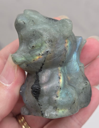 "Flower" skunk carving
