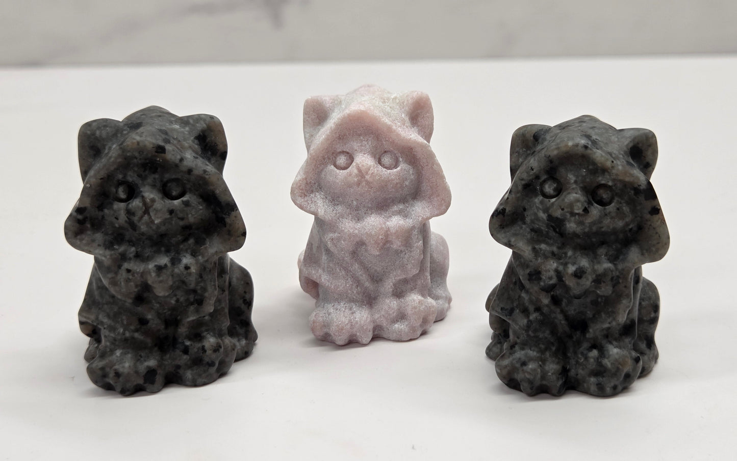 Hooded cat/kitty carving