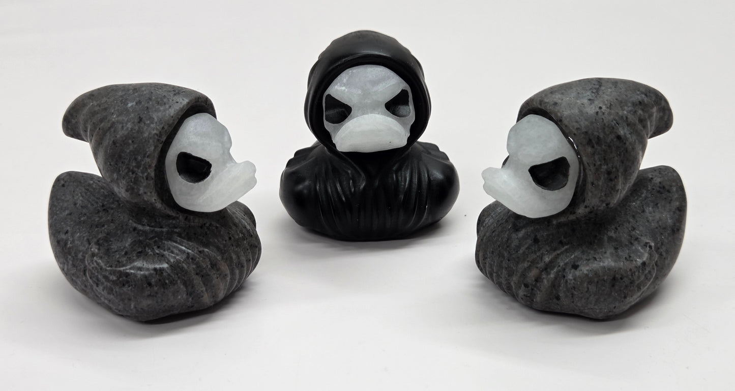 Hooded spooky duck carving