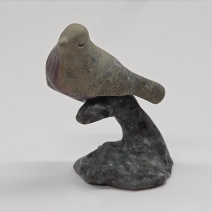 Bird on a limb carving