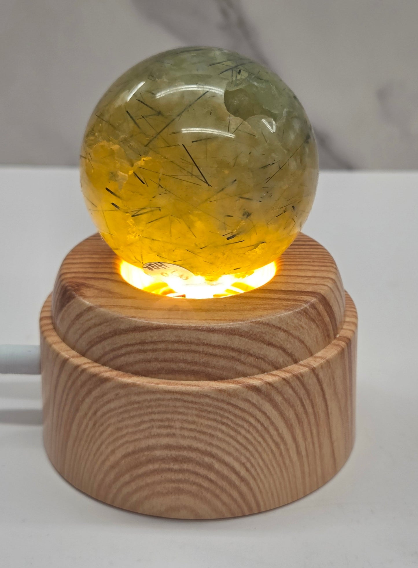 Lighted & rotating Lotus sphere stand