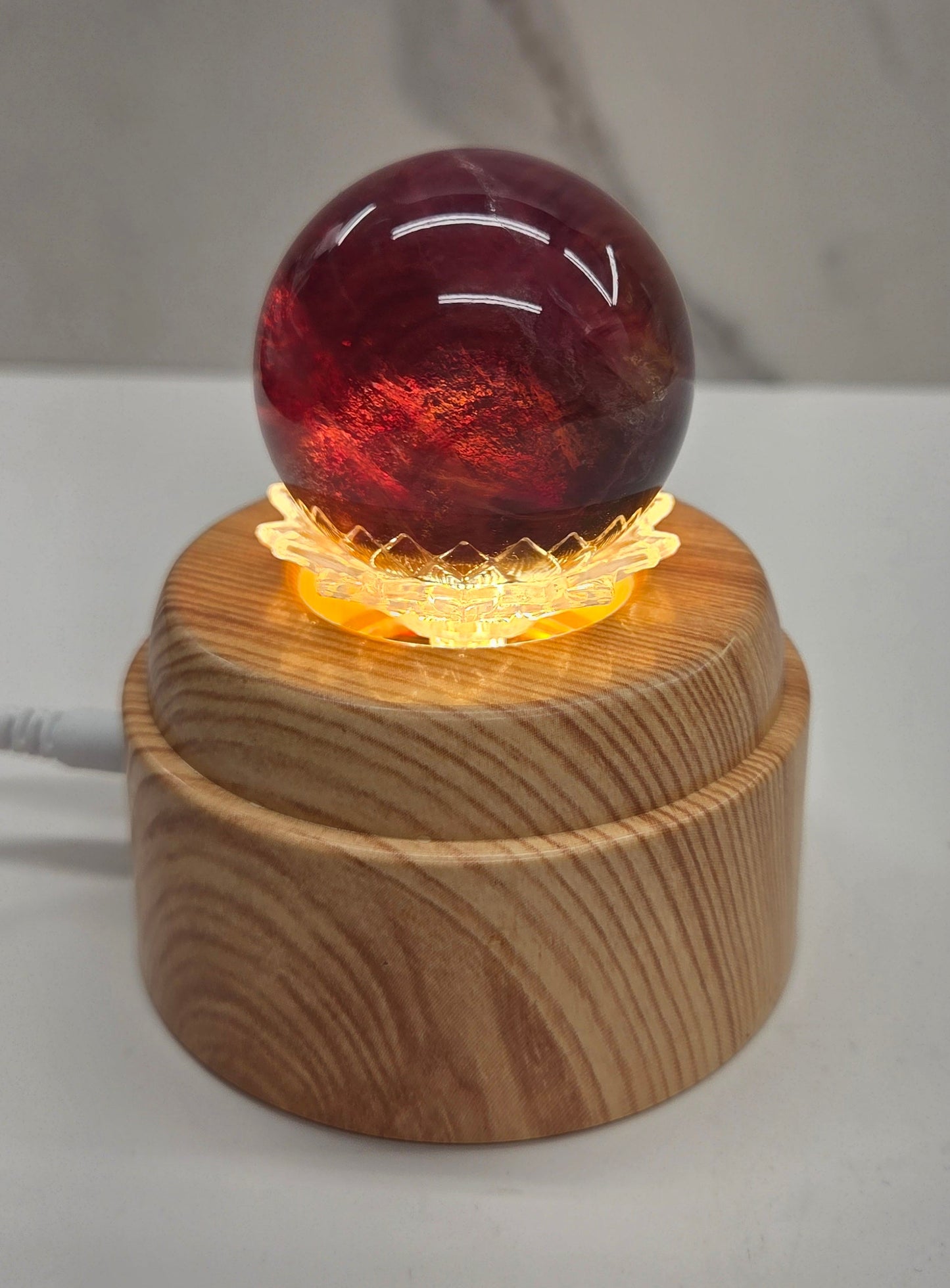 Lighted & rotating Lotus sphere stand