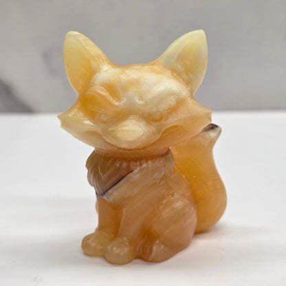Mischievous fox carving