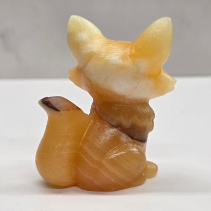 Mischievous fox carving