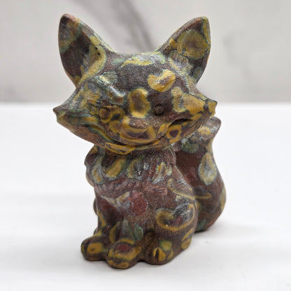 Mischievous fox carving