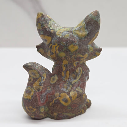 Mischievous fox carving