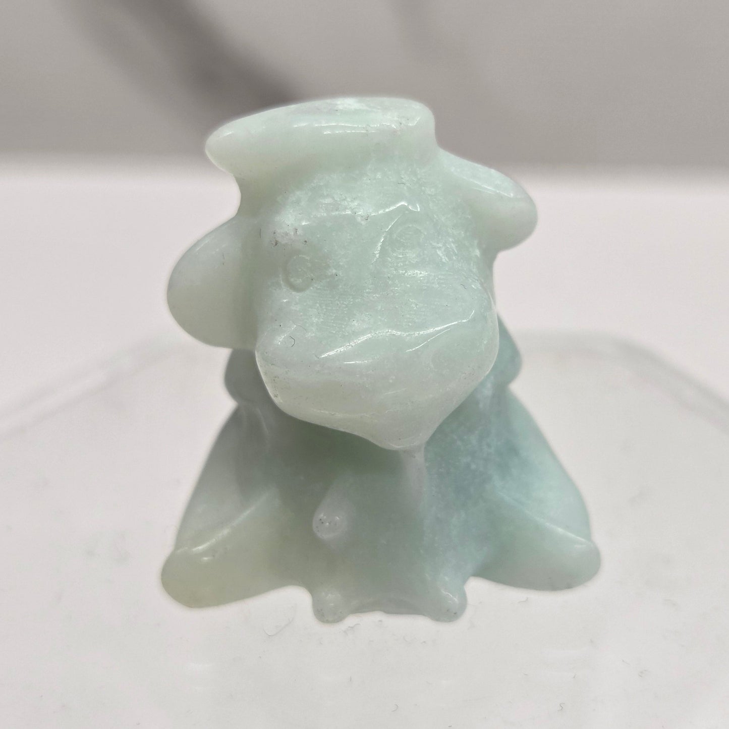 Self-milking cow carving (small)