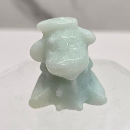 Self-milking cow carving (small)