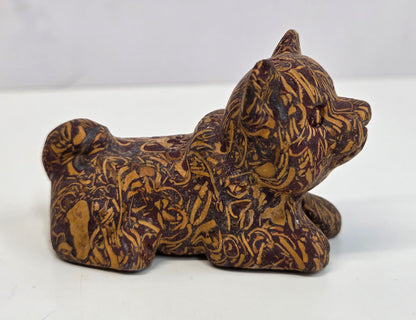 Calligraphy Jasper dog carving on a white background