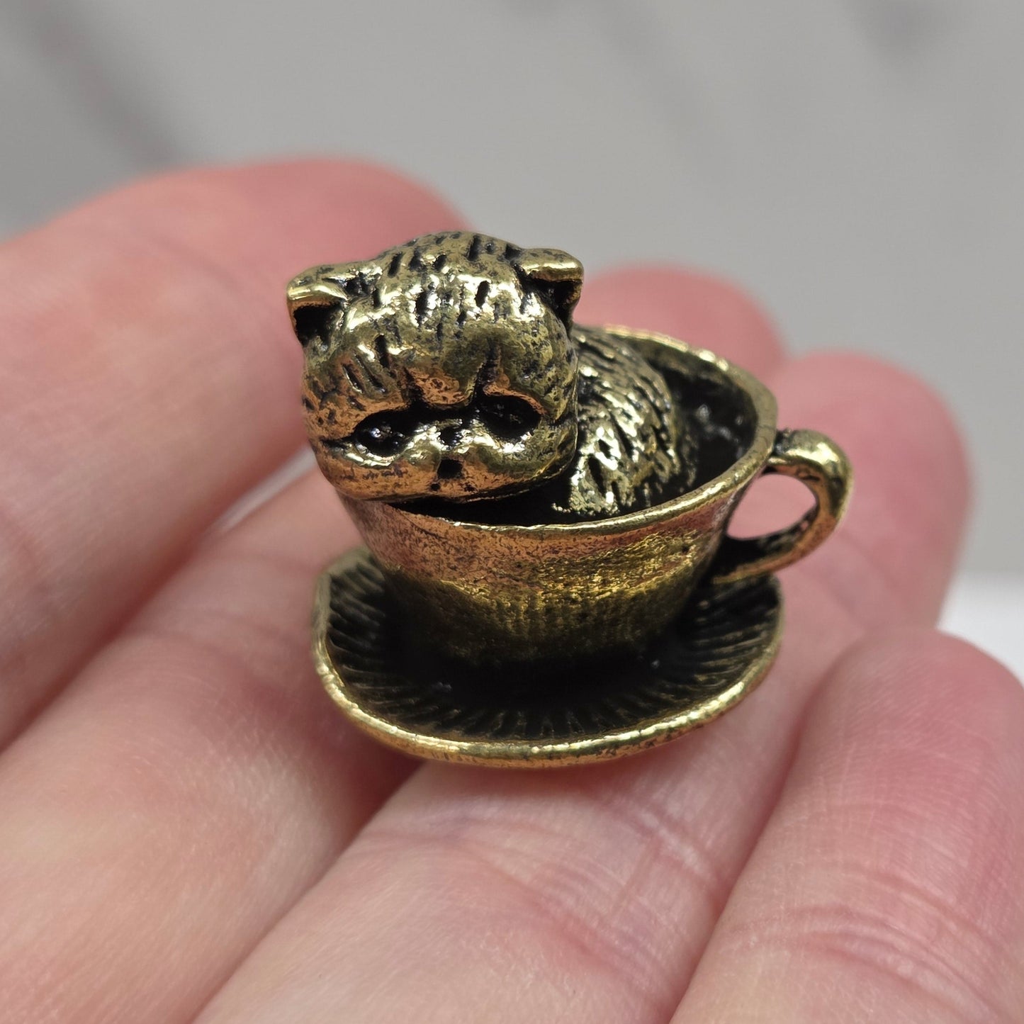 Brass kitty in cup (mini)