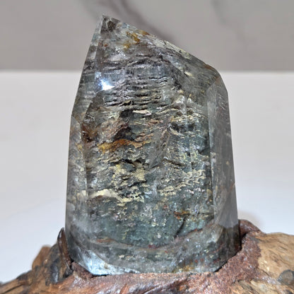 Garden Quartz statement towers on driftwood stand