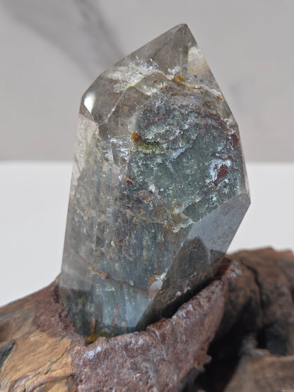 Garden Quartz statement towers on driftwood stand