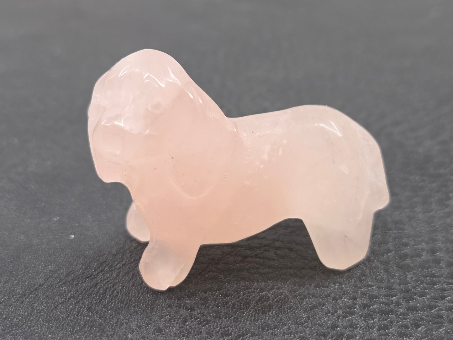 A small Dachshund dog carvings in Rose Quartz