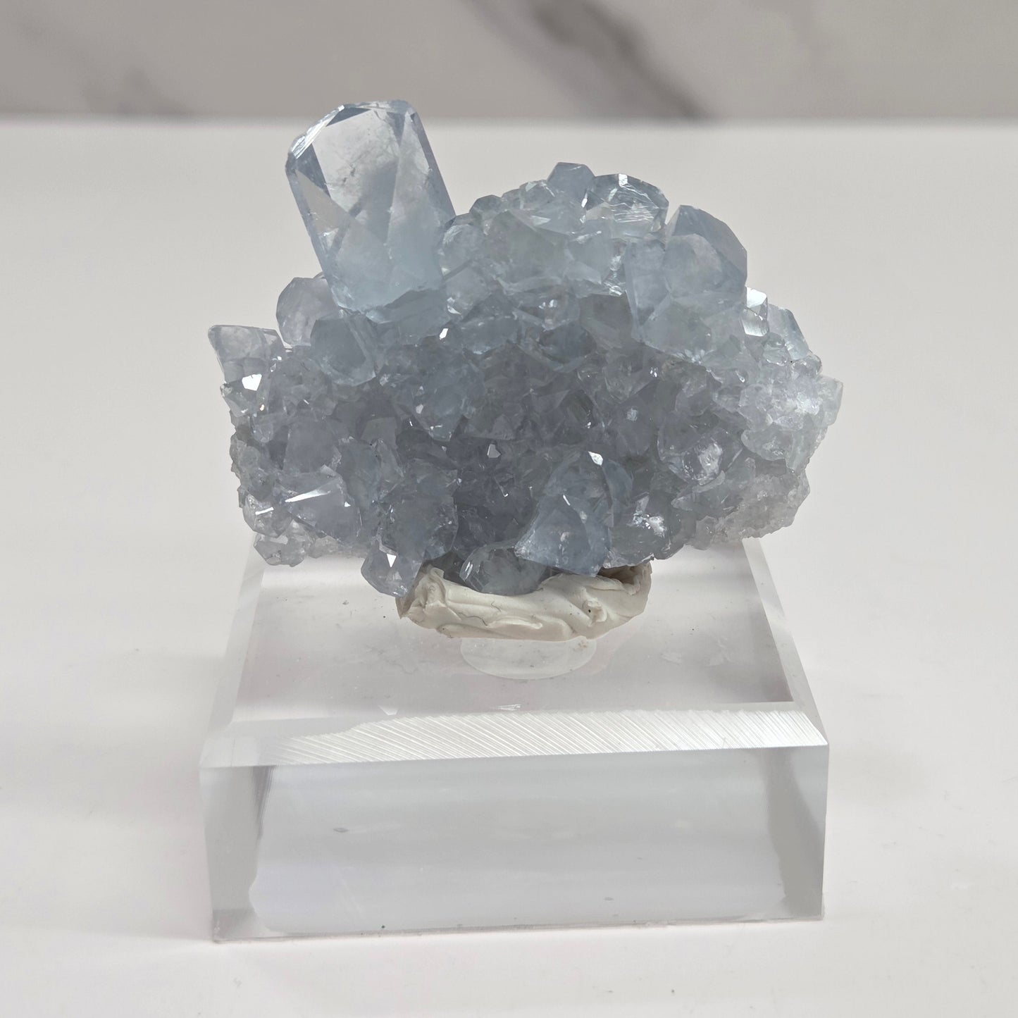 Blue Celestite crystal specimens with translucent blue crystals