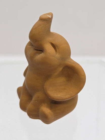 "Dumbo" baby elephant carving (S)