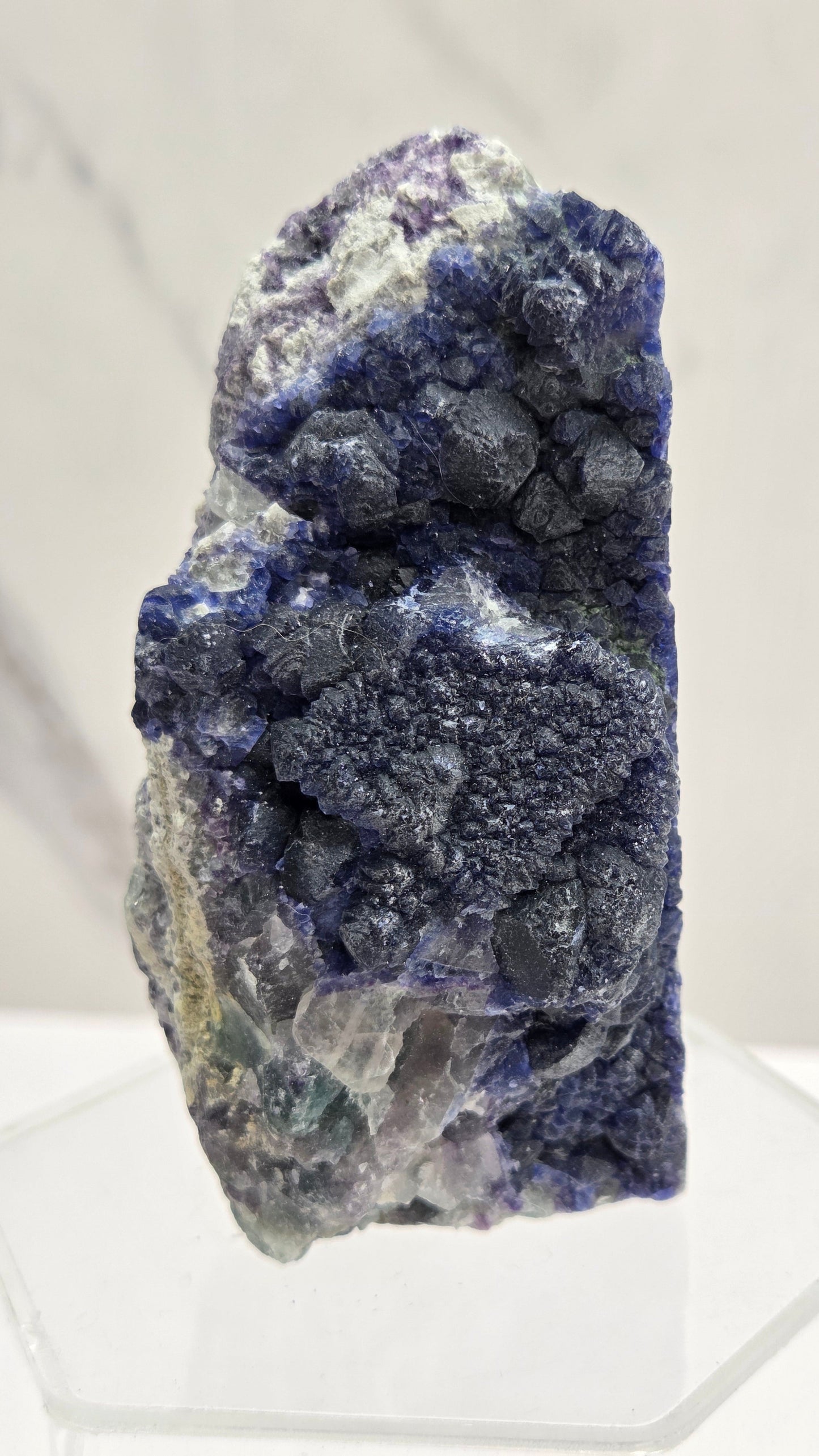 Blue  Fluorite mineral specimen on a white background