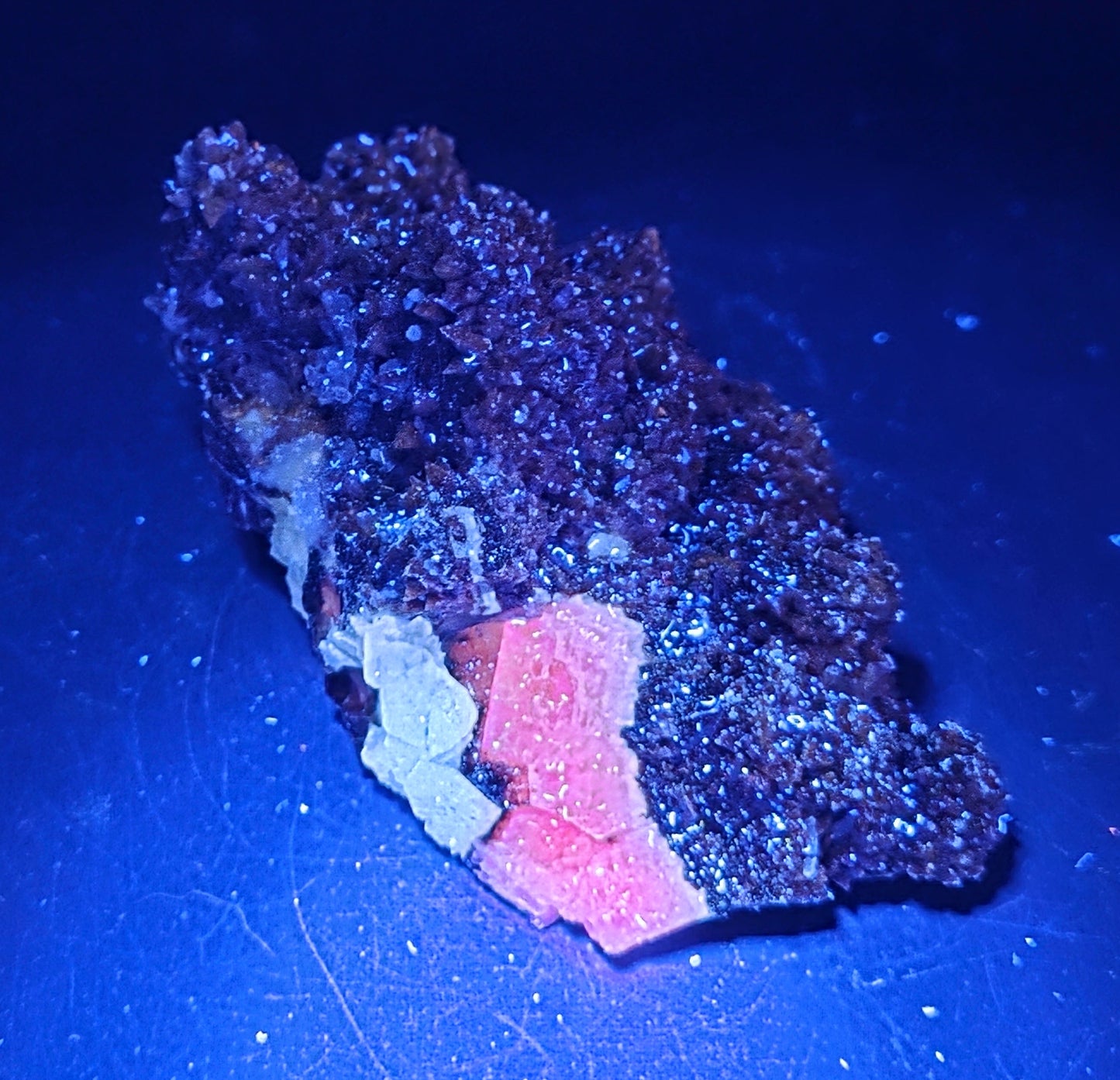 Brown Calcite specimen under UV light
