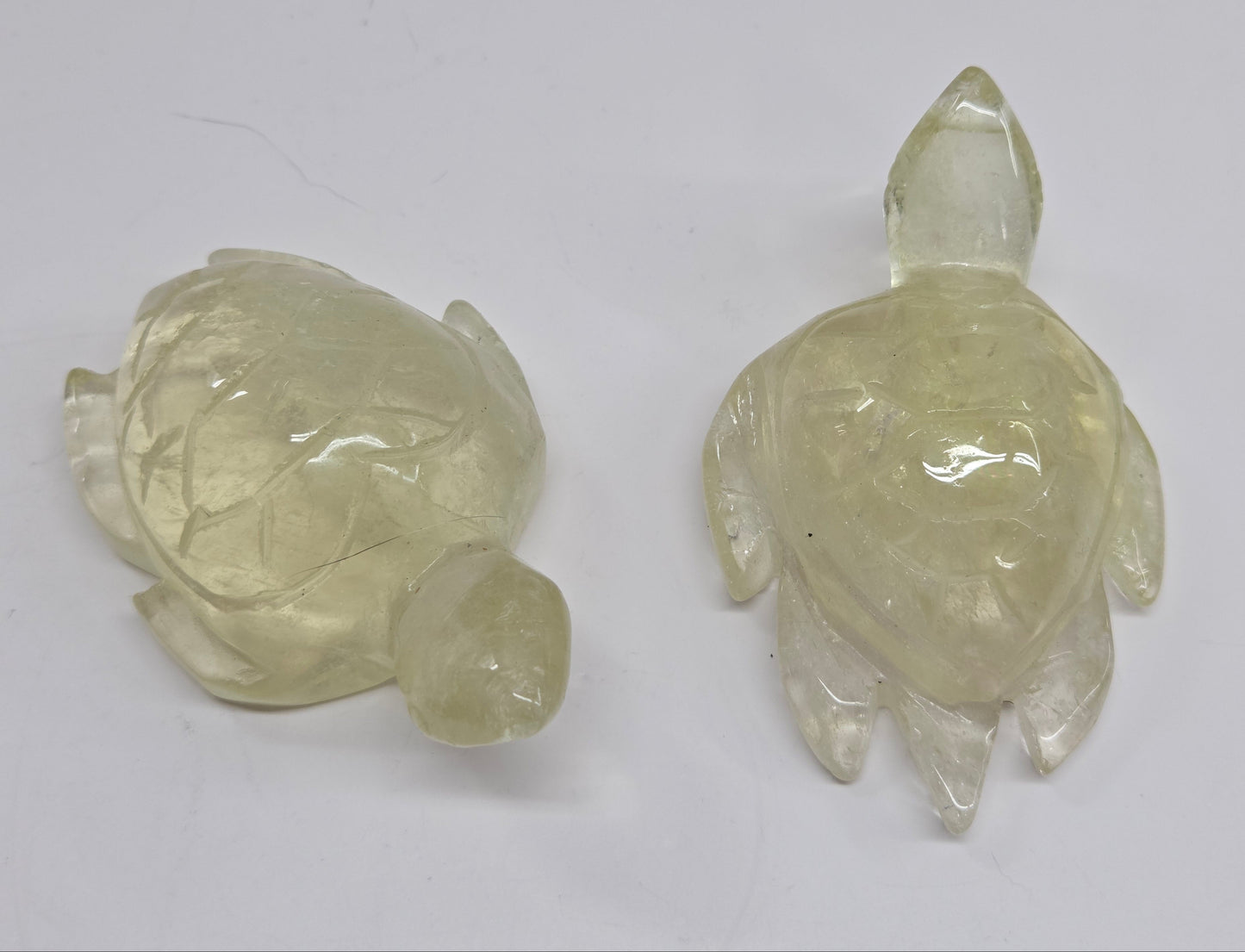 Two translucent yellow Citrine turtle carvings