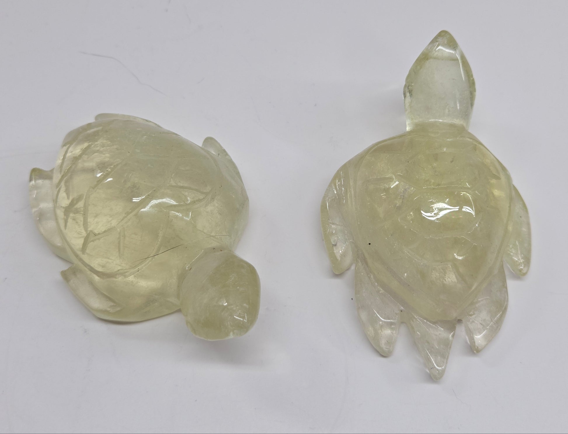 Two translucent yellow Citrine turtle carvings