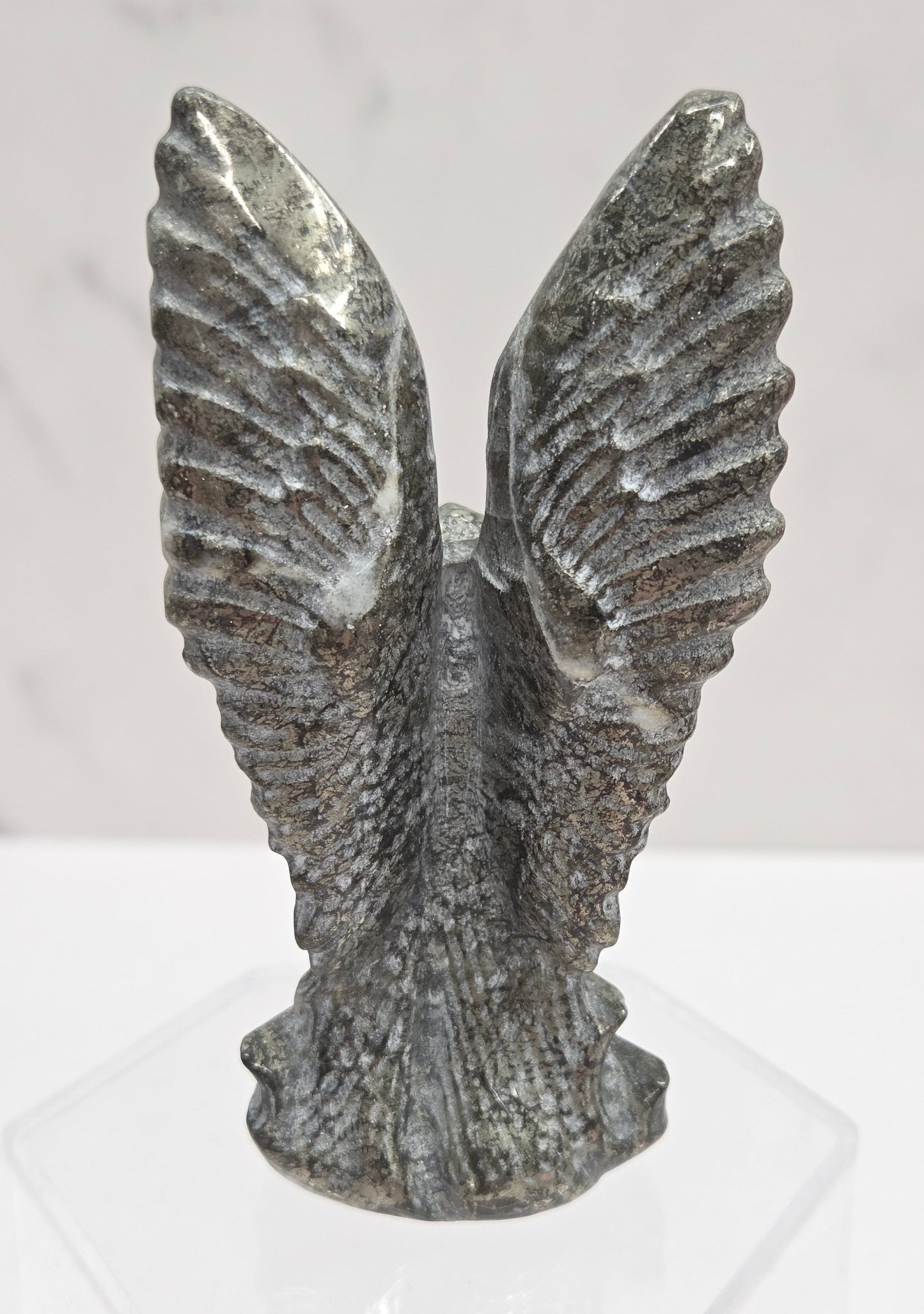 Back of Pyrite crystal angel carving 