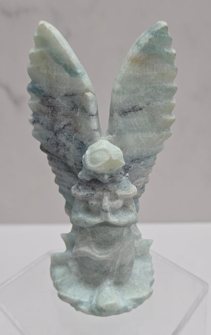 Blue Calcite crystal angel carving with blue and white banding