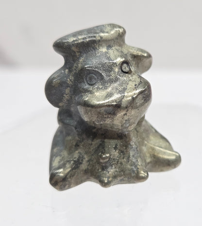 Small, self-milking cow sculptures made of Pyrite