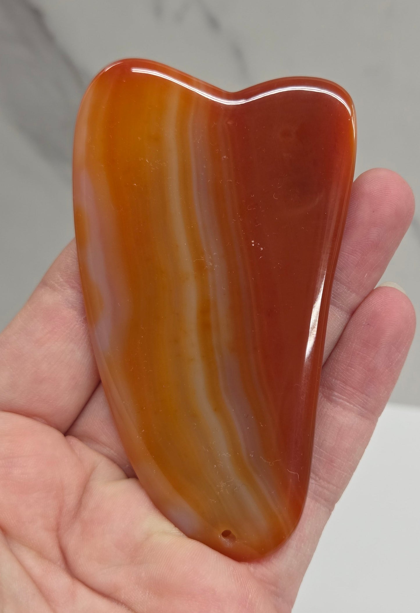 Orange banded Carnelian gua sha 