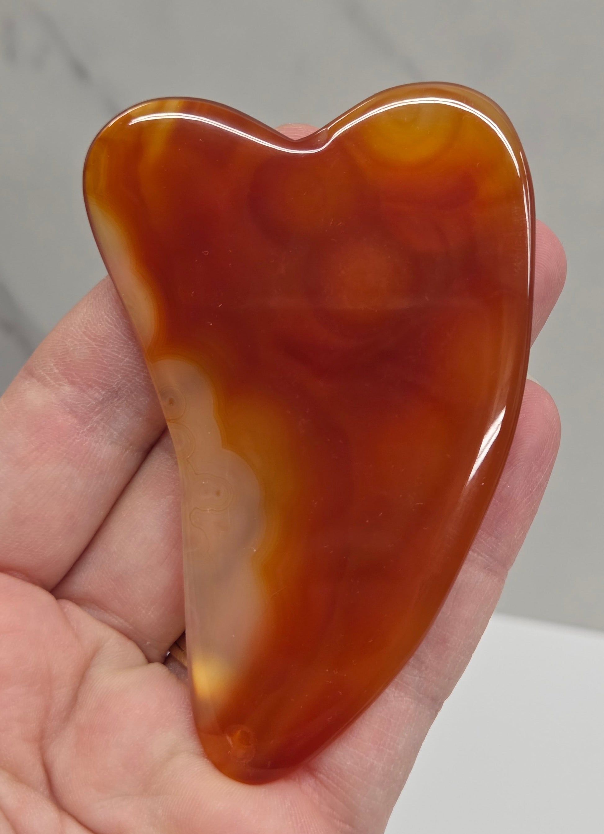 Orange banded Carnelian gua sha 