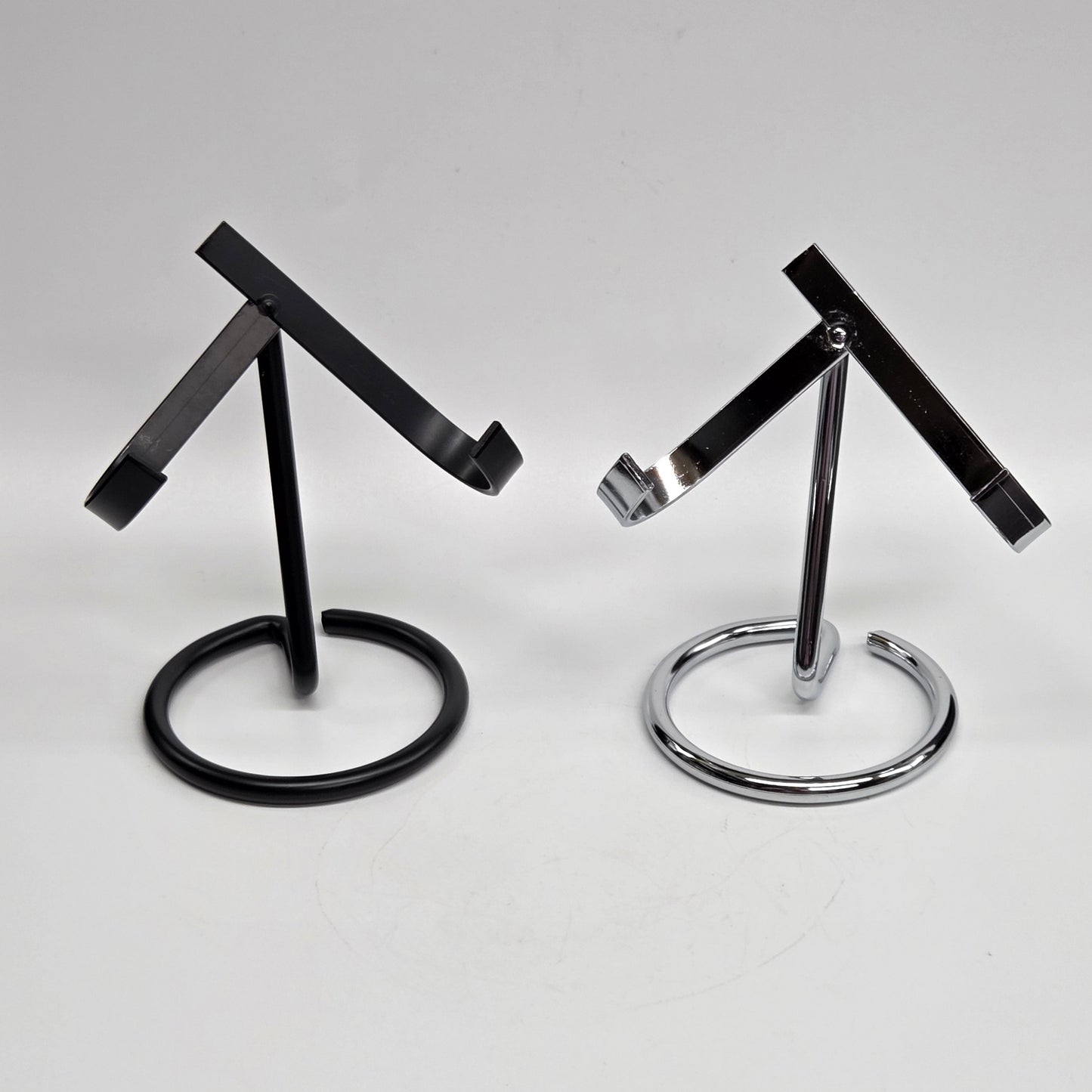 Black and silver metal display stands