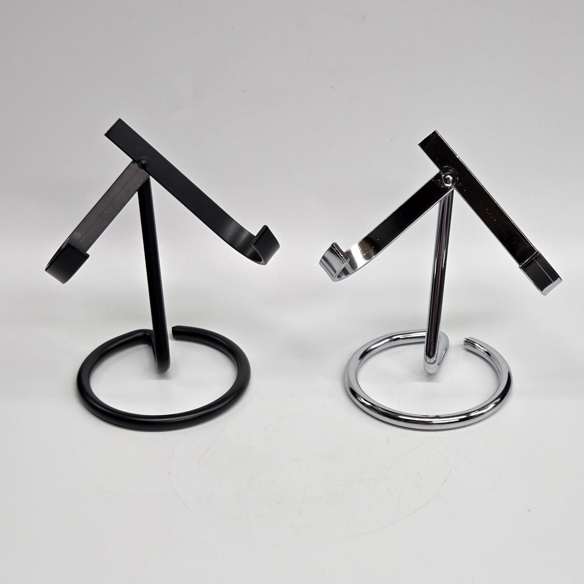 Black and silver metal display stands