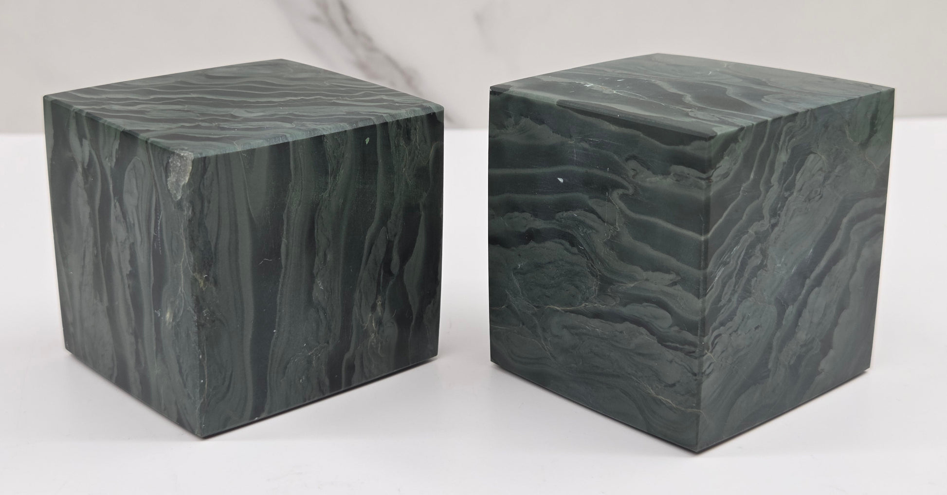 Set of 2 green wave picture jasper cubes with a wave like pattern, on a white background