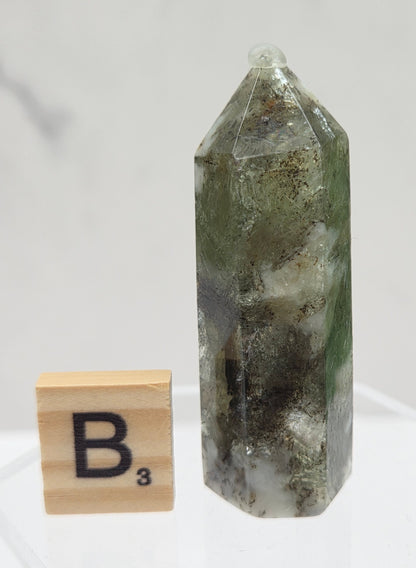 Crystal tower with a wooden block labeled 'B3' on a white background