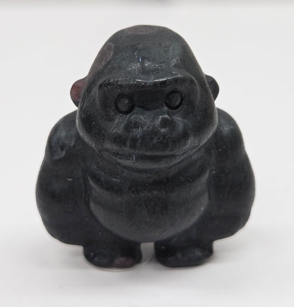 Black Garnet gorilla figurine on a white background