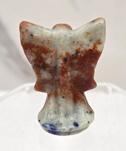 Small Sodalite angel carving on a white background