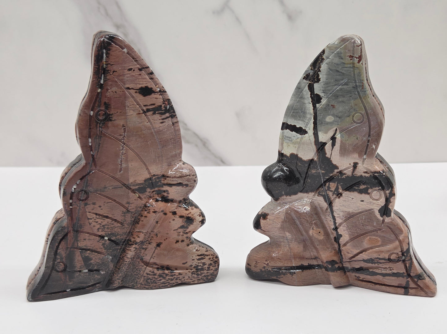 Picture Jasper fairy carvings on a white background