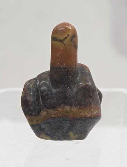A Jasper carving of a middle finger gesture.