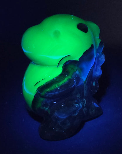 Volcano Agate cute dinosaur like carving under UV light