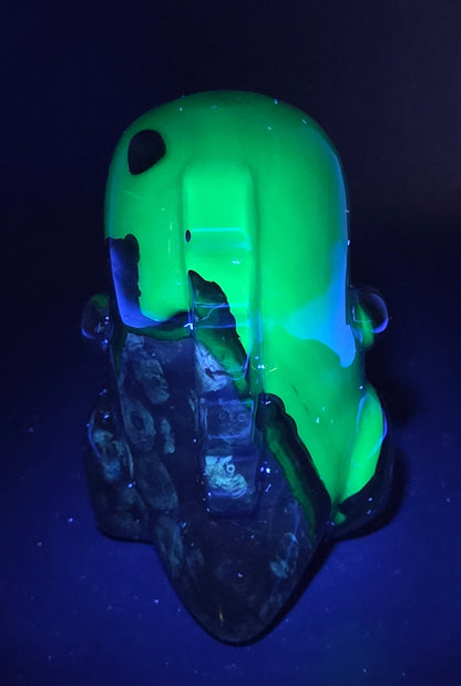 Volcano Agate cute dinosaur like carving under UV light