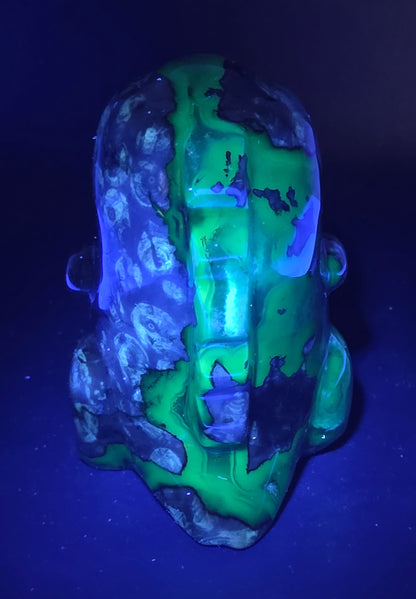 Volcano Agate cute dinosaur like carving under UV light
