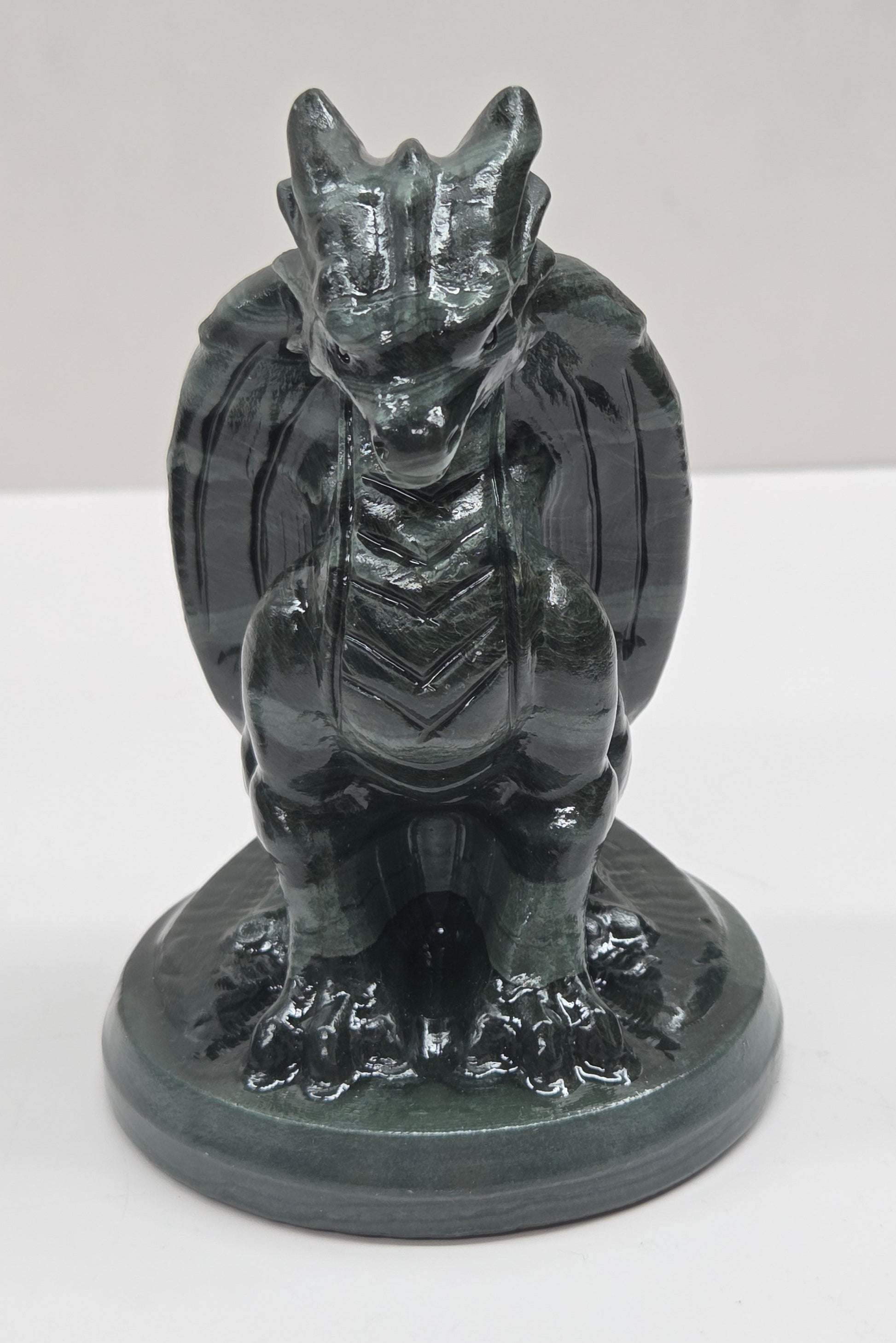Green Wave Picture Jasper crystal dragon sculpture on a white background